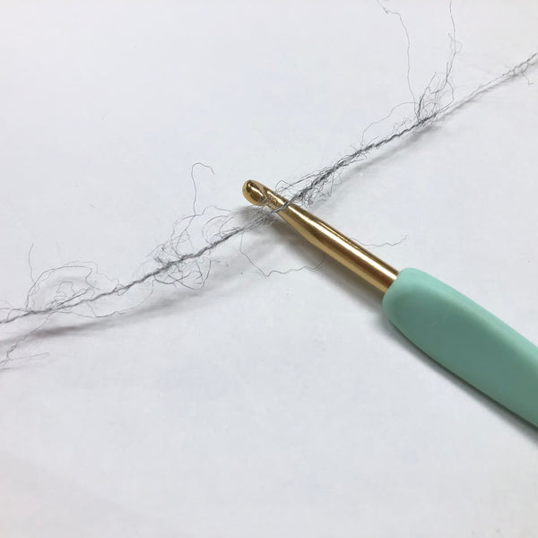もったいない糸:1017　 ウール混タム  　約300g(3900m）