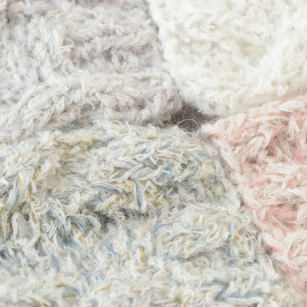 sawada itto：サワダイット-moln-ケーブル編みのレッグウォーマー