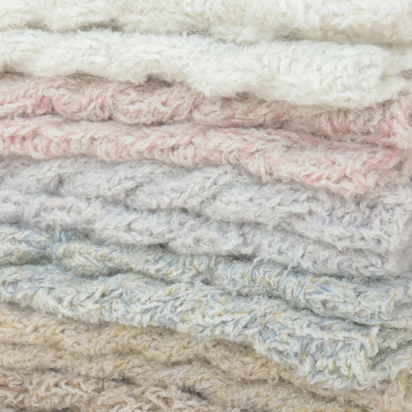 sawada itto：サワダイット-moln-ケーブル編みのレッグウォーマー