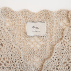 sawada itto：サワダイット-moo-お花模様の透かし編みベスト